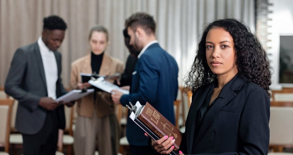 Photo by Mikhail Nilov: https://www.pexels.com/photo/people-having-a-deal-in-the-office-8730327/